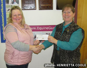 Nancy Kavanagh, Ontario's EFC representative and secretary  presents $16,000 cheque to Equine Guelph director, Gayle Ecker
