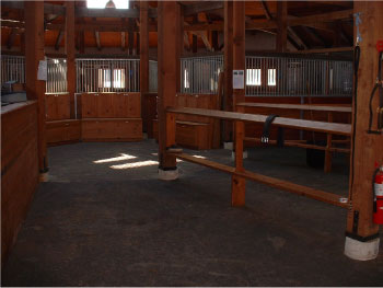 Salvaged rafters, stall posts and beams in Hop Hill barn