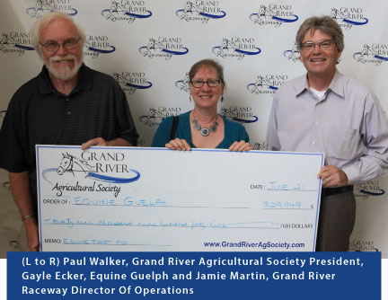 Cheque presentation (L to R) Paul Walker, Grand River Agricultural Society President, Gayle Ecker, Equine Guelph and Jamie Martin, Grand River Raceway Director Of Operations